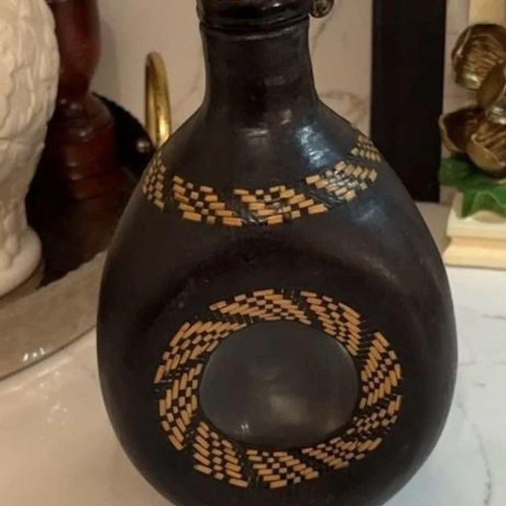 Vintage Hand-Carved Leather Wrapped Glass Decanter with Woven Detail